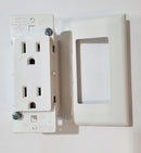 A white Pass & Seymour self-contained wall receptacle with plate, showing the receptacle separated from the plate, against a plain background.