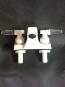 A back view of A 4-inch cream-colored bath sink lever faucet with a plastic body and stems, featuring a lever handle.