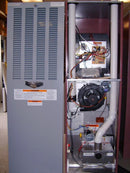 Thermo Pride mobile home furnace installed vertically showing both the exterior control panel and the internal components including heat exchanger and blower.