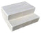 A set of two white fiberglass steps with a textured surface.